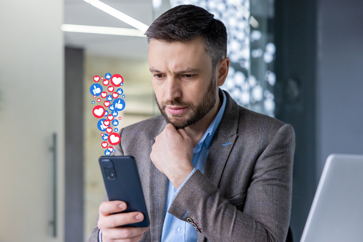 virality in marketing man look at phone with viral post