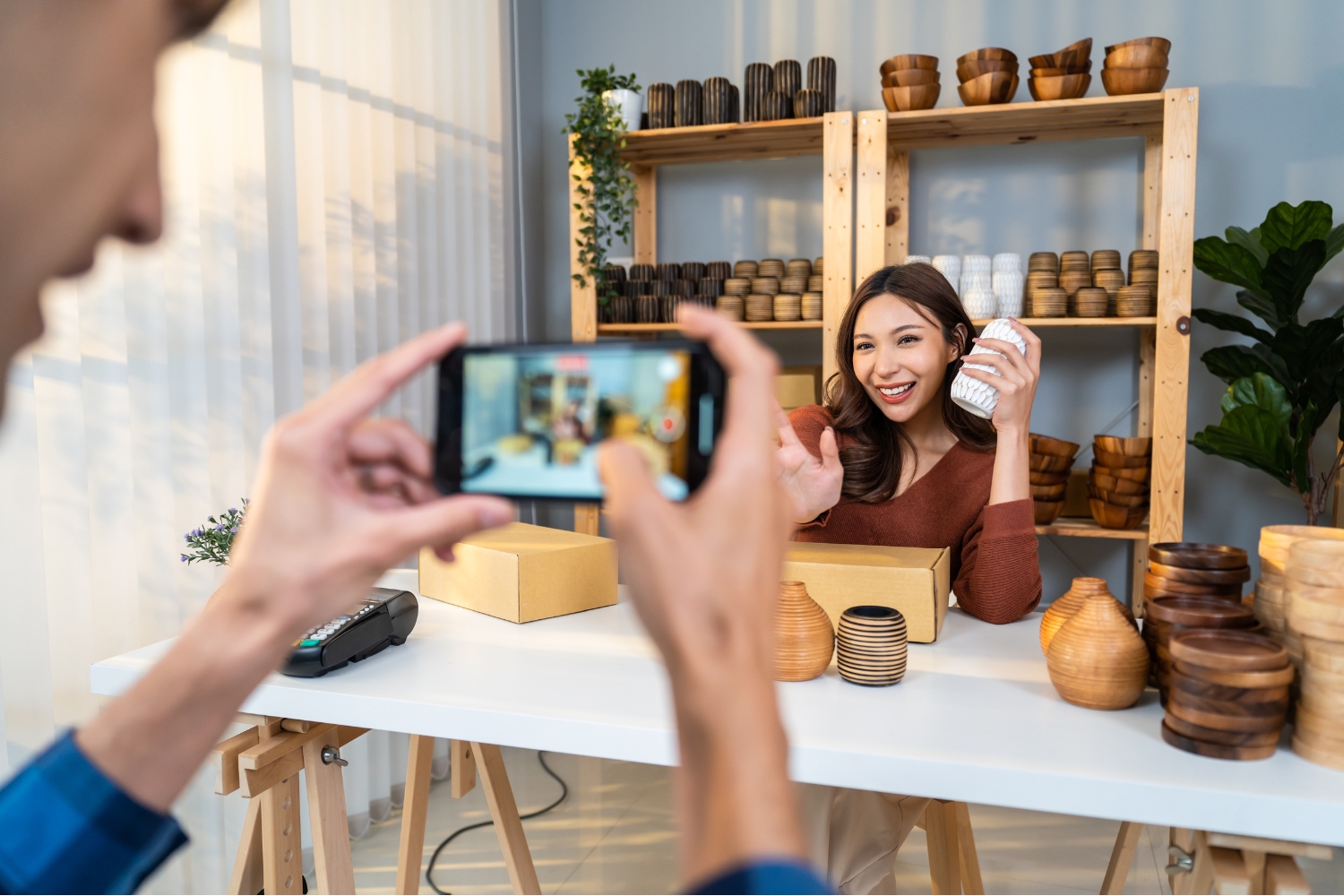 woman promoting business using social media
