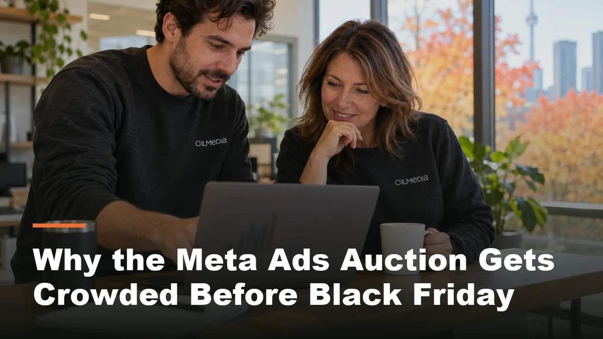 Two colleagues reviewing the Meta ads auction results ahead of Black Friday in a Toronto office